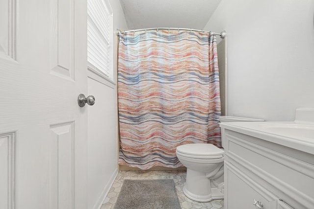 617 Schneider Dr, Fort Walton Beach, FL 32547 - full bathroom with vanity, toilet, and curtained shower