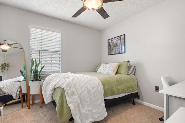 617 Schneider Dr, Fort Walton Beach, FL 32547 - bedroom featuring light carpet, a ceiling fan, baseboards, and a textured ceiling