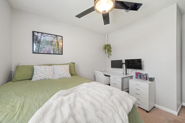 617 Schneider Dr, Fort Walton Beach, FL 32547 - bedroom with light carpet, ceiling fan, and baseboards