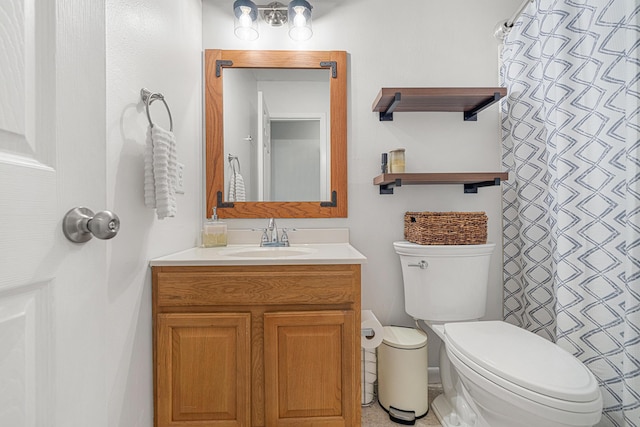 617 Schneider Dr, Fort Walton Beach, FL 32547 - bathroom with toilet, vanity, and curtained shower