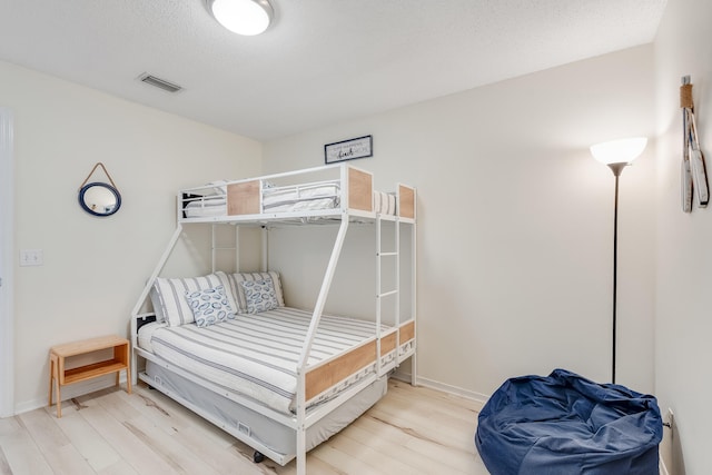 8436 Gulf Blvd Unit 734, Navarre, FL 32566 - bedroom featuring light wood-style floors and baseboards