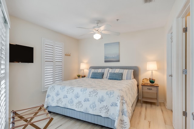8436 Gulf Blvd Unit 734, Navarre, FL 32566 - bedroom with light wood-style floors, baseboards, and ceiling fan