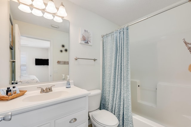 8436 Gulf Blvd Unit 734, Navarre, FL 32566 - bathroom featuring vanity, shower / bath combo with shower curtain, toilet, and ensuite bath