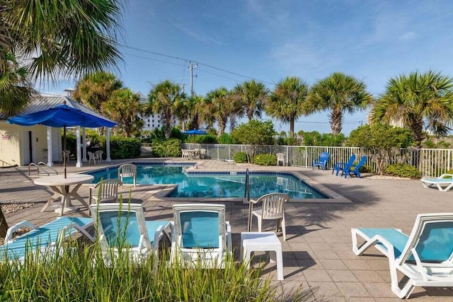 8436 Gulf Blvd Unit 734, Navarre, FL 32566 - community pool featuring a patio area and a hot tub