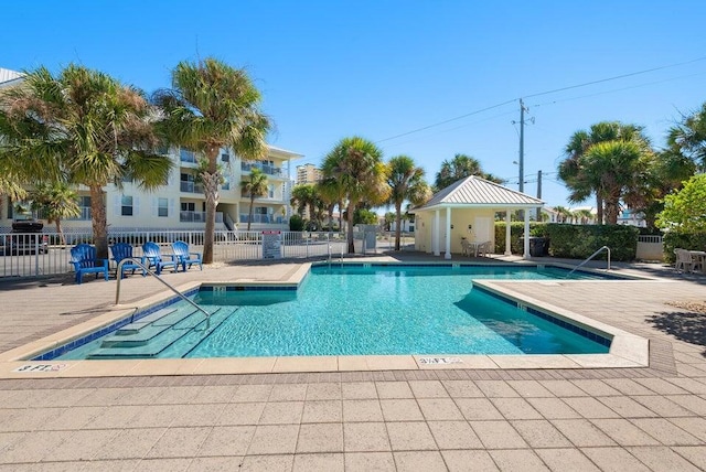 8436 Gulf Blvd Unit 734, Navarre, FL 32566 - community pool featuring a patio area