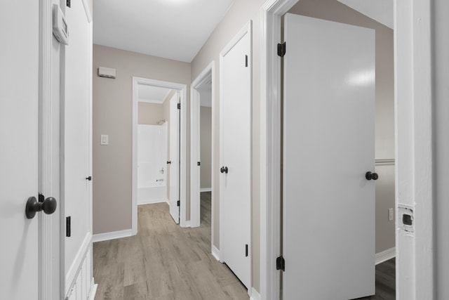 3437 Auburn Rd, Crestview, FL 32539 - hallway with light wood-style floors and baseboards