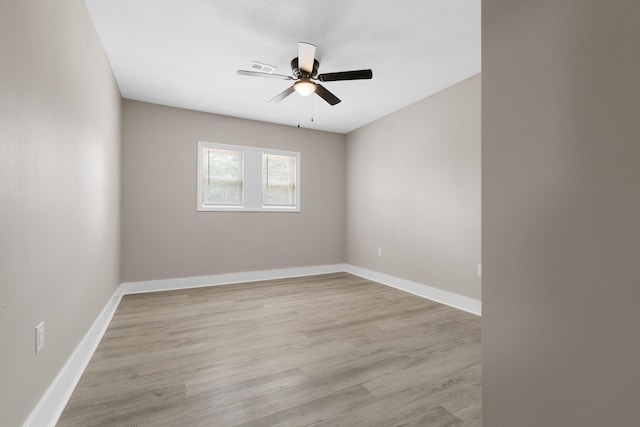 3437 Auburn Rd, Crestview, FL 32539 - empty room with ceiling fan, light wood-type flooring, and baseboards