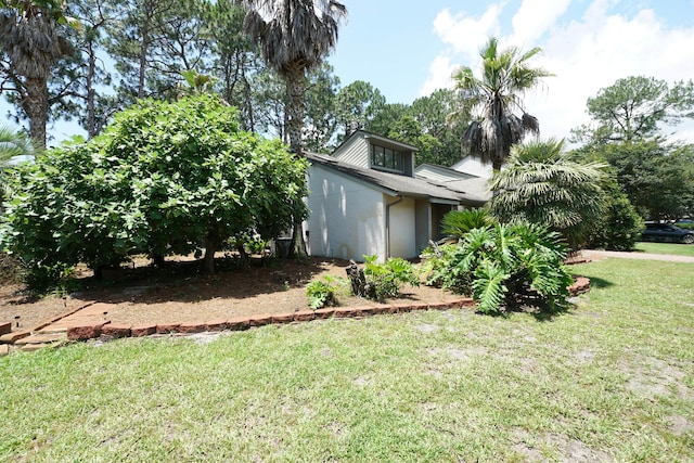 115 Gleneagles Dr, Niceville, FL 32578 - view of side of property with a lawn