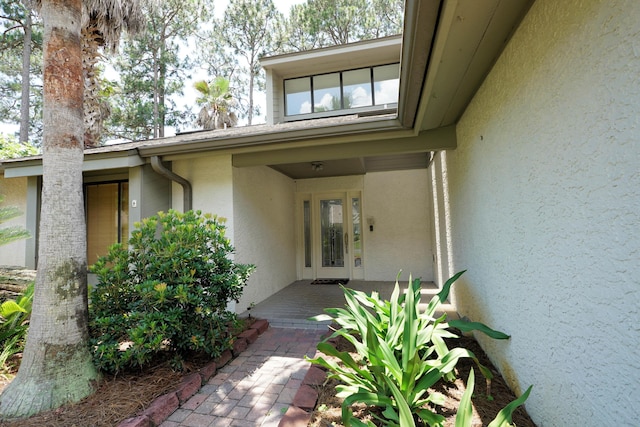 115 Gleneagles Dr, Niceville, FL 32578 - property entrance featuring stucco siding