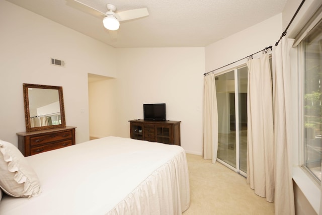115 Gleneagles Dr, Niceville, FL 32578 - bedroom with access to exterior, light colored carpet, and a ceiling fan
