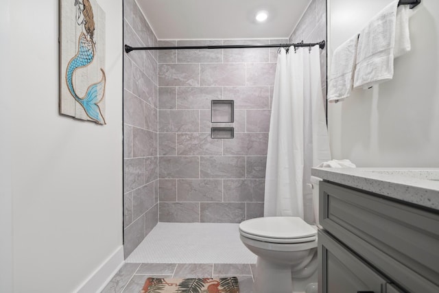 415 Gulf Shore Dr Unit 23, Destin, FL 32541 - full bathroom featuring toilet, tiled shower, vanity, and recessed lighting