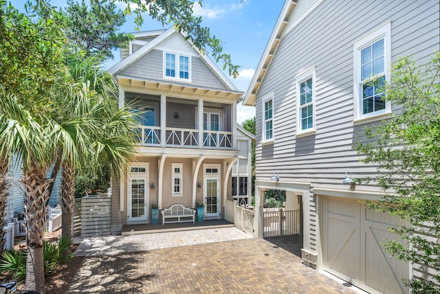 21 Founders Ct, Watersound, FL 32461 - view of front of home with a balcony