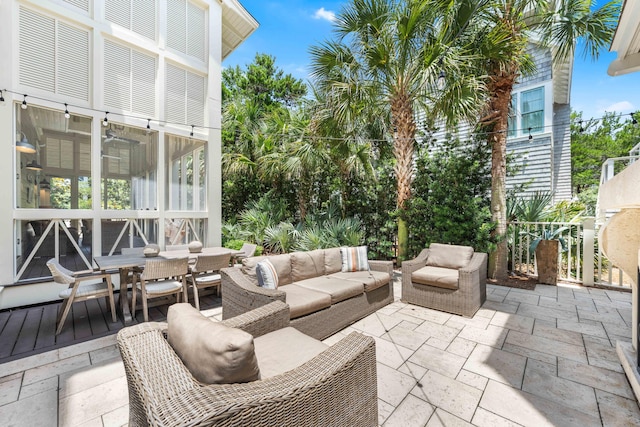 21 Founders Ct, Watersound, FL 32461 - view of patio with an outdoor living space, outdoor dining area, and a sunroom