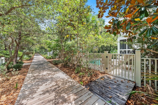 21 Founders Ct, Watersound, FL 32461 - deck featuring a sunroom