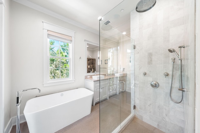 21 Founders Ct, Watersound, FL 32461 - bathroom with a shower stall, vanity, a freestanding bath, and ornamental molding