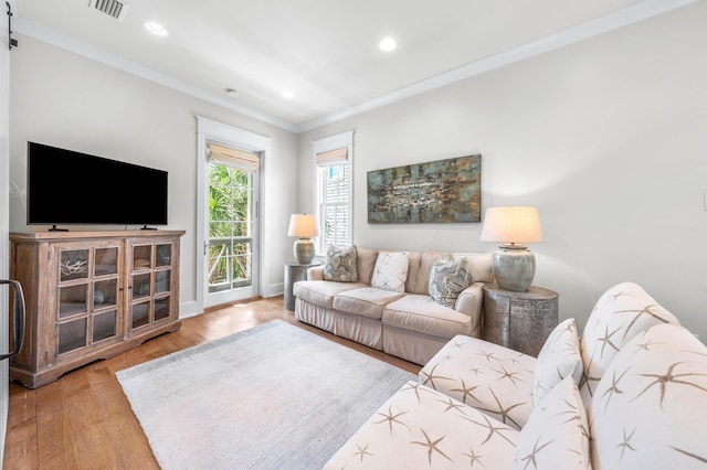 21 Founders Ct, Watersound, FL 32461 - living room with crown molding, recessed lighting, and wood finished floors