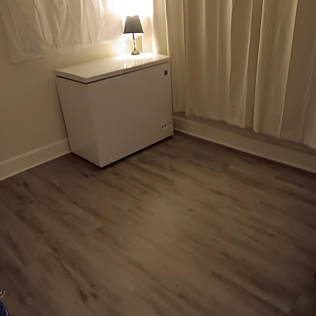 72 Park Ave, Defuniak Springs, FL 32435 - interior space with wood finished floors and baseboards