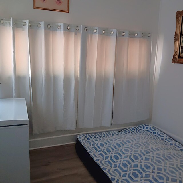 72 Park Ave, Defuniak Springs, FL 32435 - bedroom with wood finished floors