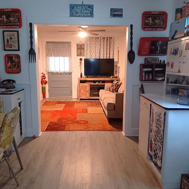 72 Park Ave, Defuniak Springs, FL 32435 - living room featuring light wood-type flooring and ceiling fan