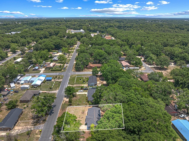 207 Oglesby Ave, Crestview, FL 32536 - aerial view of residential area featuring a forest and property parcel outlined