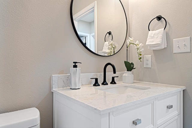 207 Oglesby Ave, Crestview, FL 32536 - half bath with vanity and a textured wall