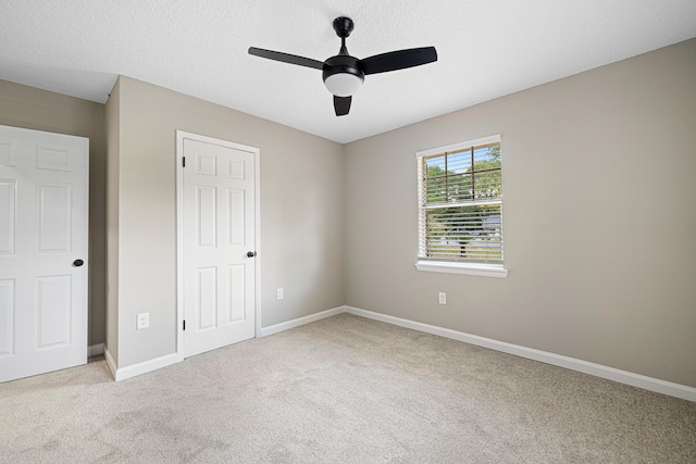 207 Oglesby Ave, Crestview, FL 32536 - unfurnished bedroom featuring carpet flooring and ceiling fan