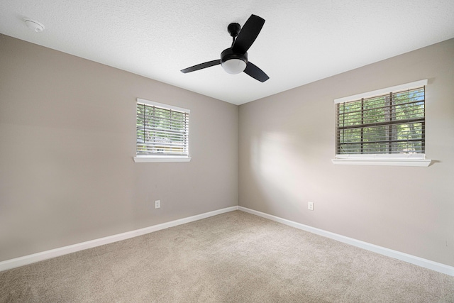 207 Oglesby Ave, Crestview, FL 32536 - carpeted empty room with baseboards and ceiling fan