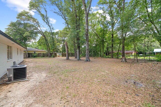 207 Oglesby Ave, Crestview, FL 32536 - view of yard with view of wooded area