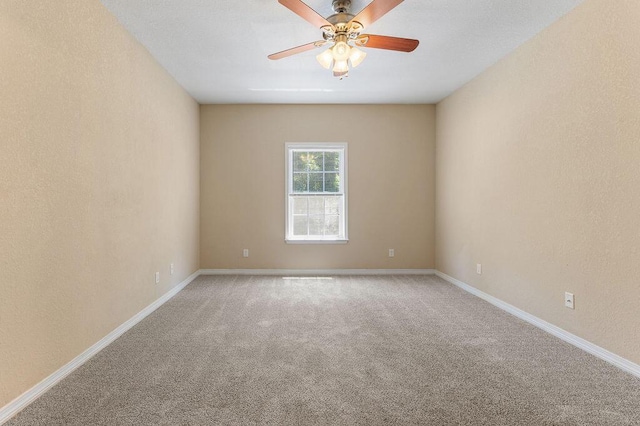 996 Leigh Ann Ln, Fort Walton Beach, FL 32547 - spare room with light colored carpet, ceiling fan, and baseboards