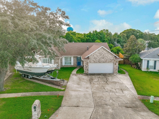 283 Stahlman Ave, Destin, FL 32541 - view of front of home with a garage, driveway, and brick siding