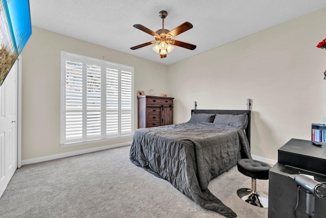 283 Stahlman Ave, Destin, FL 32541 - carpeted bedroom featuring baseboards and ceiling fan