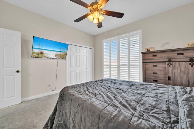 283 Stahlman Ave, Destin, FL 32541 - bedroom with carpet floors, baseboards, a closet, and ceiling fan
