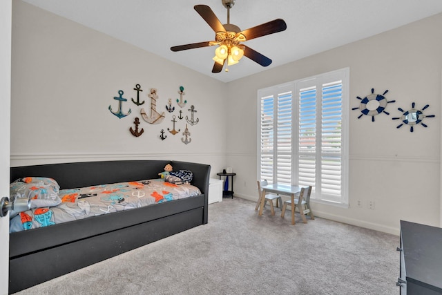 283 Stahlman Ave, Destin, FL 32541 - carpeted bedroom with baseboards, multiple windows, and a ceiling fan