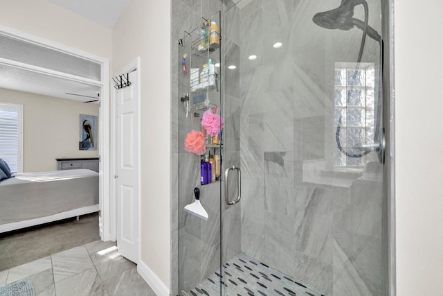283 Stahlman Ave, Destin, FL 32541 - ensuite bathroom with a shower stall and baseboards
