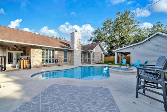 283 Stahlman Ave, Destin, FL 32541 - view of swimming pool with french doors, a ceiling fan, a patio, and a pool with connected hot tub