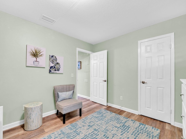 50 Gossamer Ln Unit 10, Inlet Beach, FL 32461 - sitting room featuring light wood-type flooring and baseboards