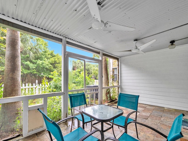 50 Gossamer Ln Unit 10, Inlet Beach, FL 32461 - sunroom / solarium featuring a ceiling fan and outdoor dining area