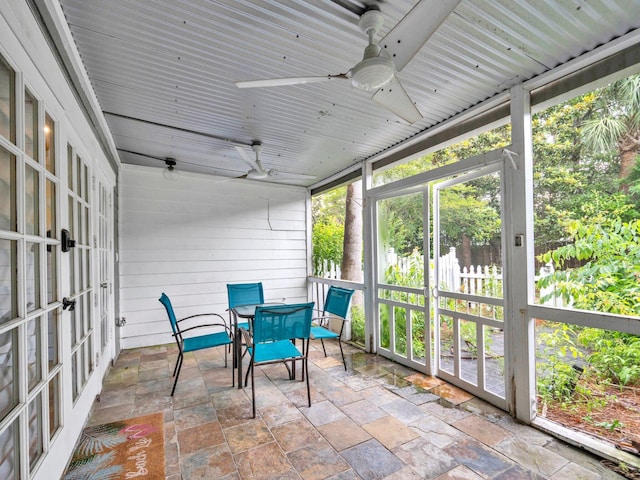 50 Gossamer Ln Unit 10, Inlet Beach, FL 32461 - sunroom with outdoor dining area, a ceiling fan, and french doors