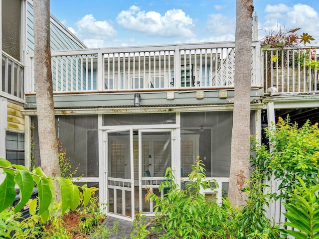 50 Gossamer Ln Unit 10, Inlet Beach, FL 32461 - back of property featuring a balcony and a sunroom