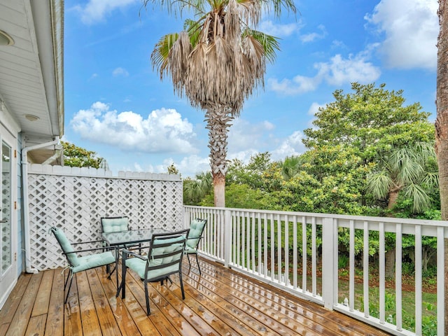 50 Gossamer Ln Unit 10, Inlet Beach, FL 32461 - wooden deck featuring outdoor dining area