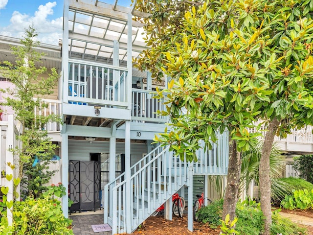 50 Gossamer Ln Unit 10, Inlet Beach, FL 32461 - back of property with stairway and a pergola