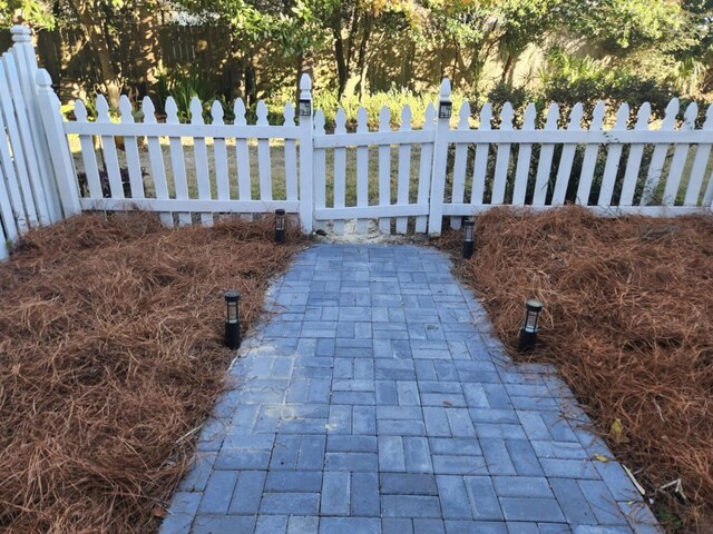 50 Gossamer Ln Unit 10, Inlet Beach, FL 32461 - gate featuring a patio