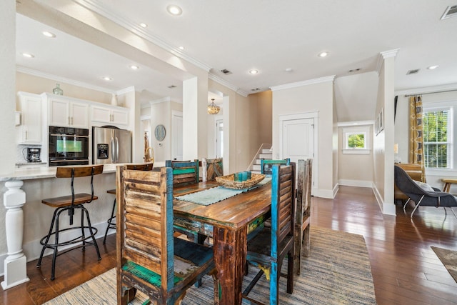 51 Grande Pointe Dr, Inlet Beach, FL 32461 - dining room with dark wood-style flooring, stairs, ornamental molding, recessed lighting, and baseboards