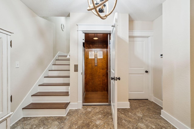 51 Grande Pointe Dr, Inlet Beach, FL 32461 - stairway featuring tile patterned floors, baseboards, and elevator