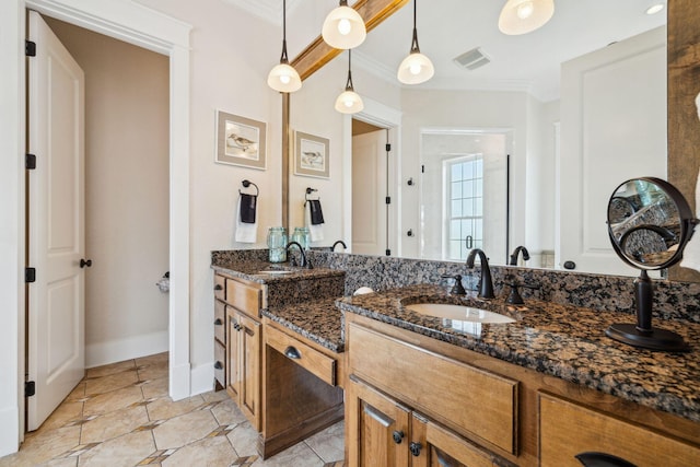 51 Grande Pointe Dr, Inlet Beach, FL 32461 - bathroom with ornamental molding, double vanity, and baseboards