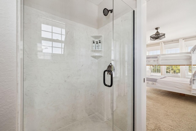 51 Grande Pointe Dr, Inlet Beach, FL 32461 - full bathroom featuring a shower stall, connected bathroom, and ceiling fan