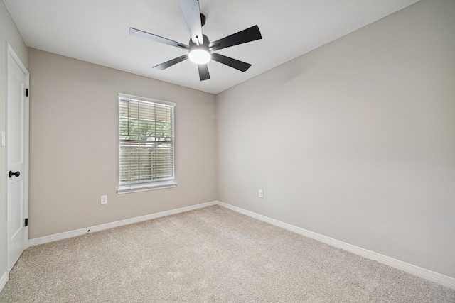 28 6th St, Shalimar, FL 32579 - empty room with light colored carpet, a ceiling fan, and baseboards