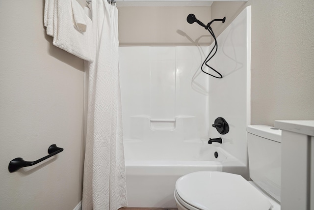 28 6th St, Shalimar, FL 32579 - bathroom featuring toilet and shower / bath combo with shower curtain