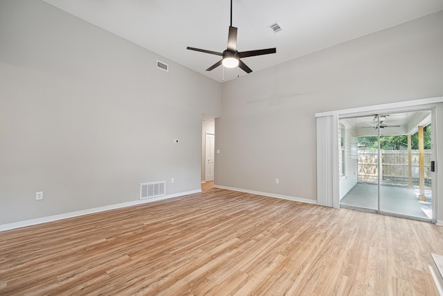 28 6th St, Shalimar, FL 32579 - spare room with ceiling fan, light wood-type flooring, baseboards, and a high ceiling