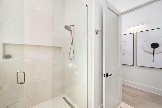 LOT36 Grande Pointe Cir, Inlet Beach, FL 32461 - full bathroom featuring a stall shower, wood finished floors, and baseboards